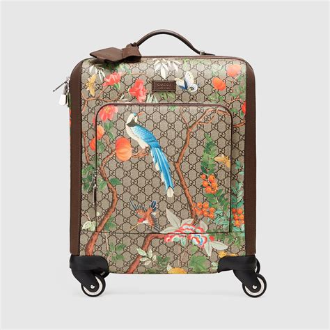 gucci ro luggage.